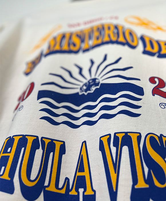 Close-up of a Chula Vista flipped logo with text and wave design on a white background